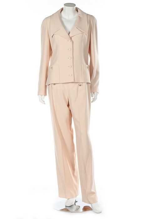 Lot 38 - A Chanel Boutique cream silk trouser suit,...