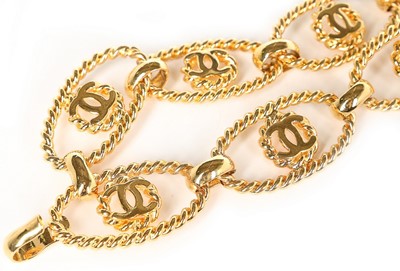 Lot 280 - A Chanel gilt metal chain linked belt, 1980s,...