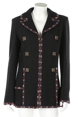 Lot 40 - A Chanel Boutique black tweed jacket, 2000s,...