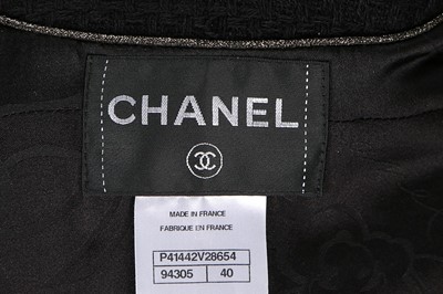 Lot 40 - A Chanel Boutique black tweed jacket, 2000s,...