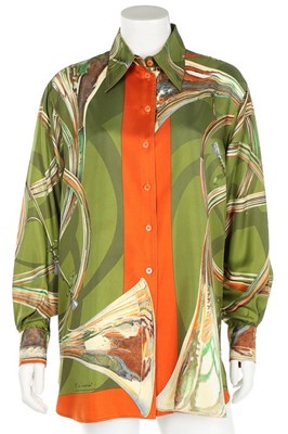 Lot 209 - An Hermès silk shirt printed with brass...