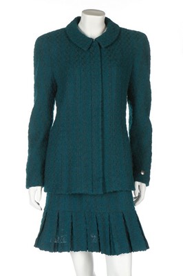 Lot 290 - A Chanel forest-green bouclé wool suit, 1997,...