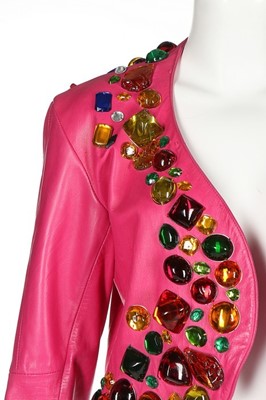 Lot 318 - An Yves Saint Laurent hot-pink 'gem' adorned...