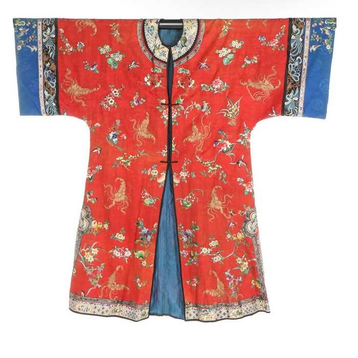 Lot 356 - A woman's embroidered red satin informal