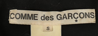 Lot 164 - A Comme des Garçons black crushed velvet dress,...