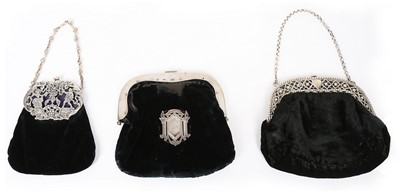 Lot 232 - Five black purses with silver frames...