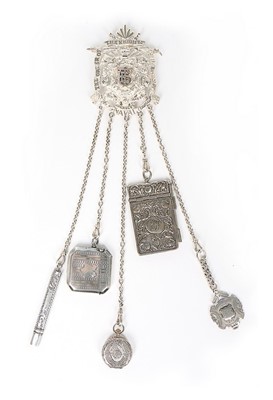 Lot 233 - A solid silver chatelaine with five chains,...