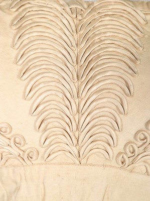 Lot 250 - An ivory silk evening dress, circa 1820,...