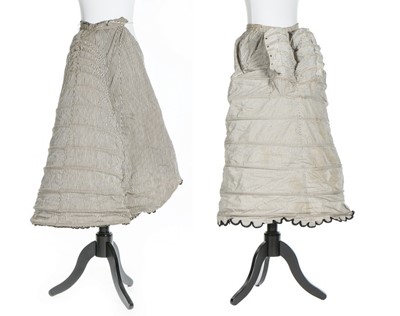 Lot 253 - Two striped calico bustle petticoats, 1870s,...