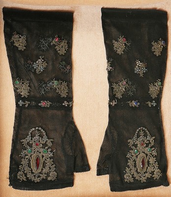 Lot 248 - A pair of jewel encrusted black mesh mittens,...