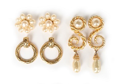 Lot 279 - Three pairs of Chanel earrings, circa 1990,...