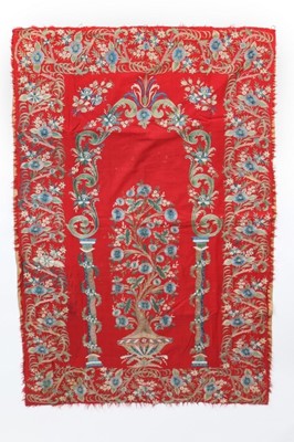 Lot 346 - An embroidered scarlet wool prayer arch,...