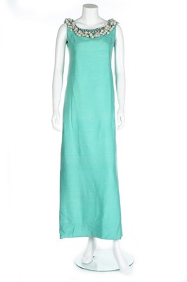 Lot 152 - A Christian Dior turquoise silk evening gown,...
