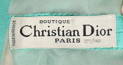 Lot 152 - A Christian Dior turquoise silk evening gown,...