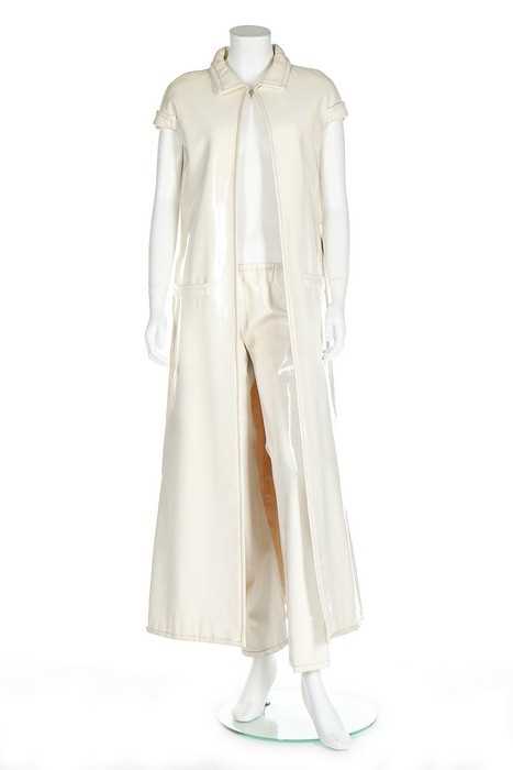 Lot 168 - A Courrèges couture ivory vinyl maxi ensemble,...