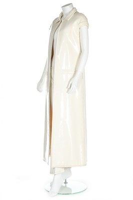 Lot 168 - A Courrèges couture ivory vinyl maxi ensemble,...