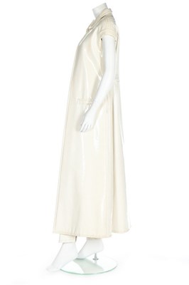 Lot 168 - A Courrèges couture ivory vinyl maxi ensemble,...