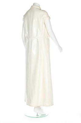 Lot 168 - A Courrèges couture ivory vinyl maxi ensemble,...