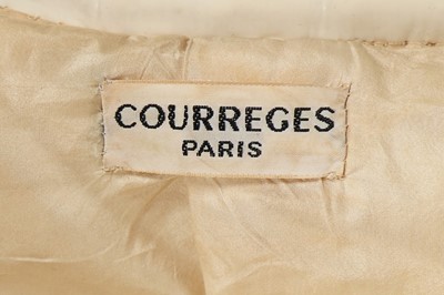 Lot 168 - A Courrèges couture ivory vinyl maxi ensemble,...