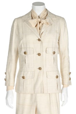 Lot 200 - A Chanel couture ivory slubbed silk/linen suit,...