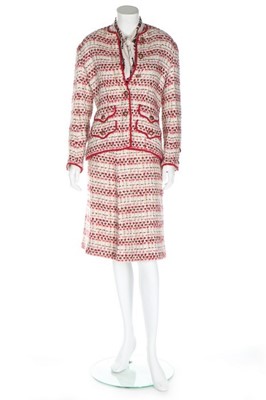 Lot 203 - A Chanel couture tweed suit, Spring-Summer,...