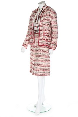 Lot 203 - A Chanel couture tweed suit, Spring-Summer,...