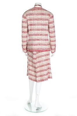 Lot 203 - A Chanel couture tweed suit, Spring-Summer,...