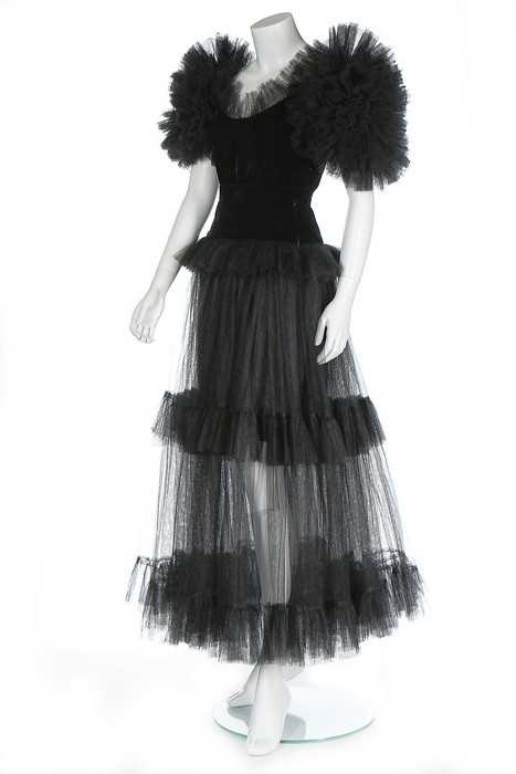 Lot 224 - An Yves Saint Laurent black tulle and velvet...