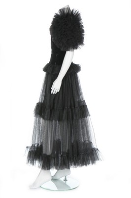 Lot 224 - An Yves Saint Laurent black tulle and velvet...