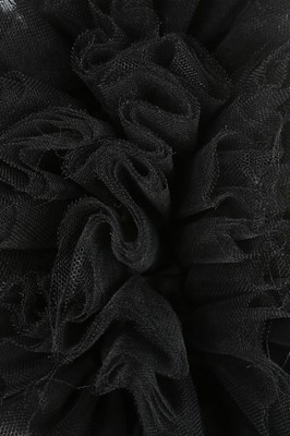 Lot 224 - An Yves Saint Laurent black tulle and velvet...