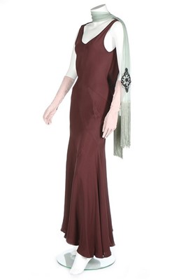 Lot 251 - A John Galliano wine viscose crêpe bias cut...