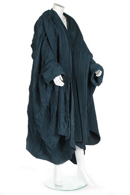 Lot 231 - A Romeo Gigli peacock-blue pleated cocoon coat,...