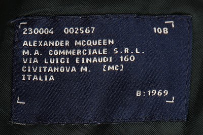 Lot 229 - An early Alexander McQueen man's camel coat,...