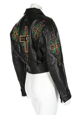 Lot 216 - A Gianni Versace black leather 'Crucifix'...