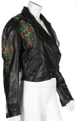 Lot 216 - A Gianni Versace black leather 'Crucifix'...