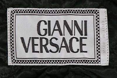 Lot 217 - A Gianni Versace studded black leather jacket,...