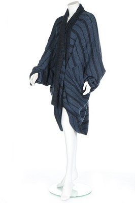 Lot 264 - An Issey Miyake black and blue knitted batwing...