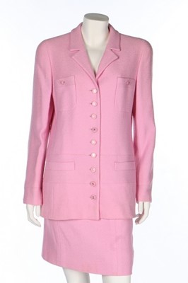 Lot 306 - A Chanel boutique pink wool summer suit, 1990s,...