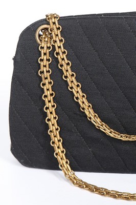 Lot 6 - A Chanel chevron quilted black jersey handbag,...