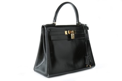 Lot 8 - An Hermès black leather Kelly bag, 1987,...