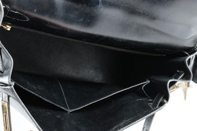 Lot 8 - An Hermès black leather Kelly bag, 1987,...
