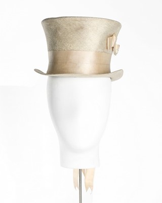 Lot 50 - An unusual white beaver top hat for a boy or a...