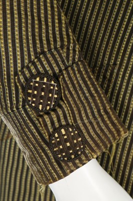 Lot 38 - A young man's striped black and yellow silk...