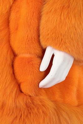 Lot 15 - A Christian Dior dyed-orange mink and fox fur...
