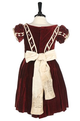Lot 31 - An unusual commemorative child's dress, 1863,...