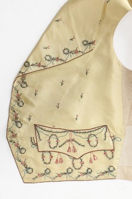 Lot 44 - A primrose-yellow silk ribbon embroidered...