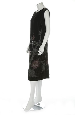 Lot 55 - An Adair beaded black velvet evening gown, mid...