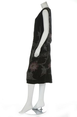 Lot 55 - An Adair beaded black velvet evening gown, mid...