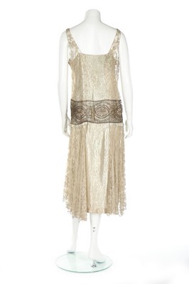 Lot 57 - A Molyneux couture silver lace and lamé...