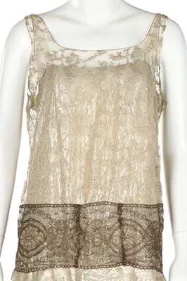 Lot 57 - A Molyneux couture silver lace and lamé...